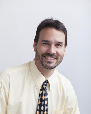 Headshot of Adam Klarkowski