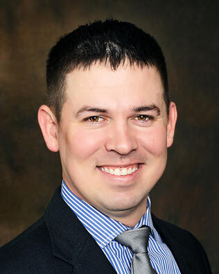 Headshot of Justin Smith