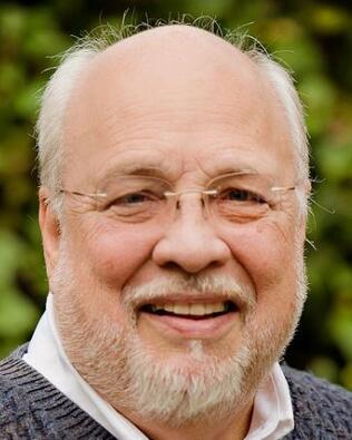 Headshot of James Shrader