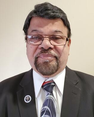 Headshot of Varghese Abraham