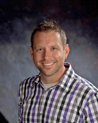 Headshot of Chris Carson