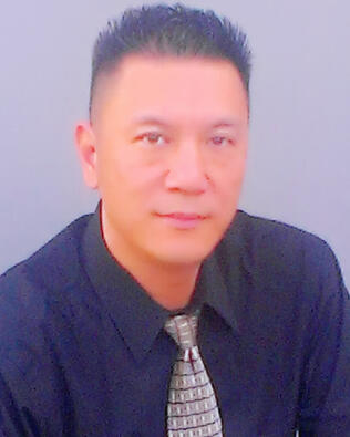 Headshot of Sam Zhang