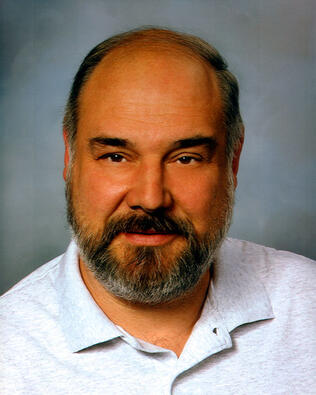 Headshot of Thomas Suriano