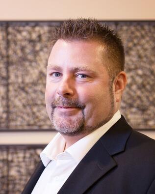 Headshot of John Easterly
