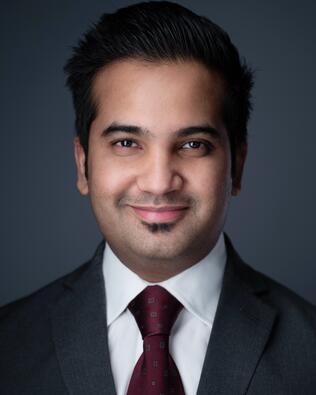 Headshot of Amanat Ali