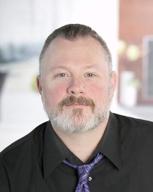 Headshot of Benjiman Tomlinson