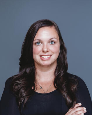 Headshot of Ashley Tola