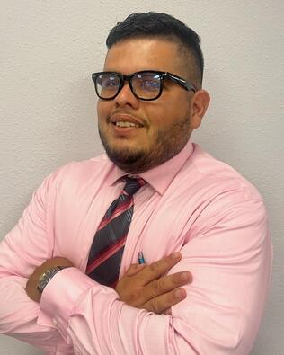 Headshot of Eric Torres