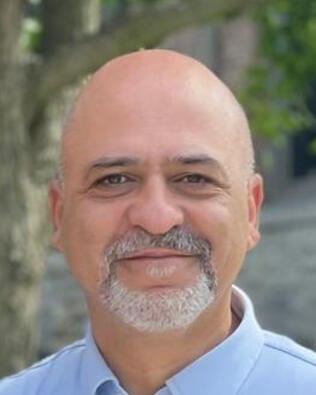 Headshot of Behrouz Hoghoughi