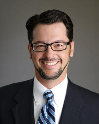 Headshot of Damon Duck