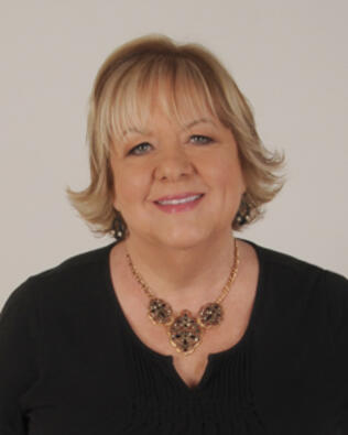 Headshot of Carol Kellison