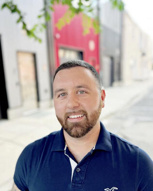 Headshot of Adam McLane