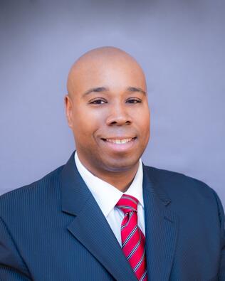 Headshot of Lionel H. Alexander