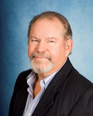 Headshot of Monty Wiens