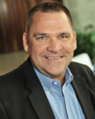 Headshot of William Royster