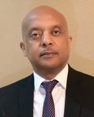 Headshot of Tekie Goitom