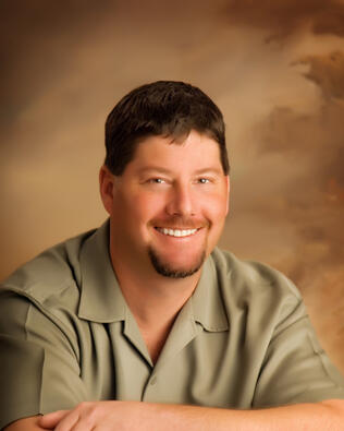 Headshot of Jason Thompson