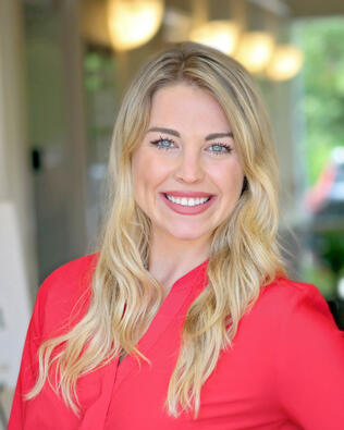Headshot of Cortlyn Hughes