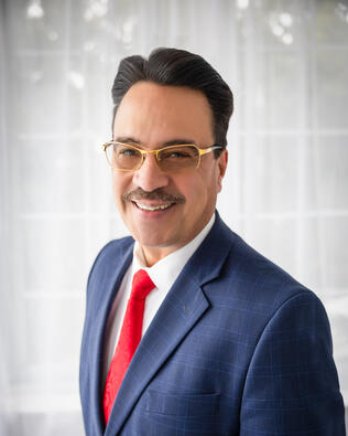 Headshot of Adrian Romero