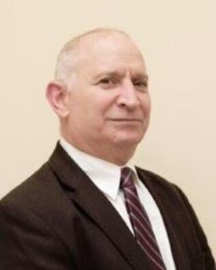 Headshot of William Krasner