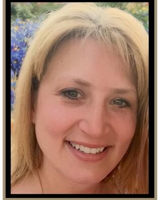 Headshot of Keri Archambault