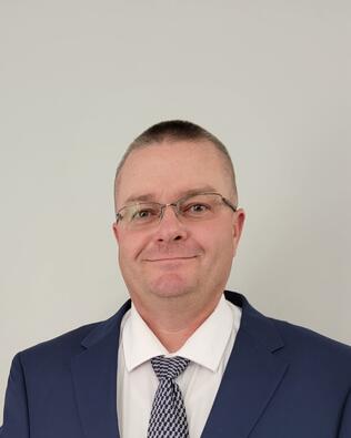 Headshot of Michael Juvenal