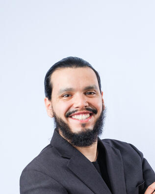 Headshot of Andrae Calderon