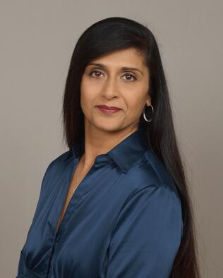 Headshot of Neena Singh