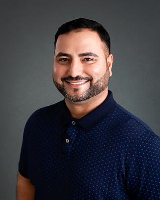 Headshot of Pooya Roohani