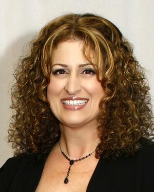 Headshot of Gina Miller-Rodriguez