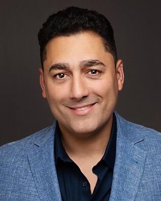 Headshot of Chris Romero