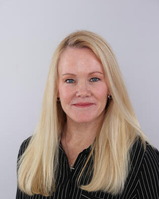 Headshot of Kelly Rettman