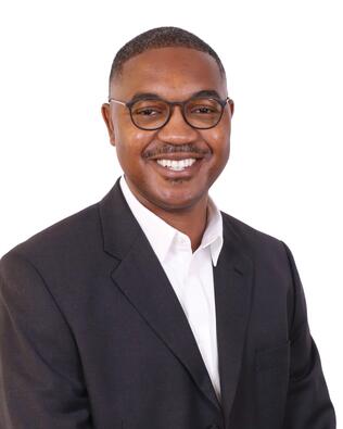 Headshot of Adrian McKinney