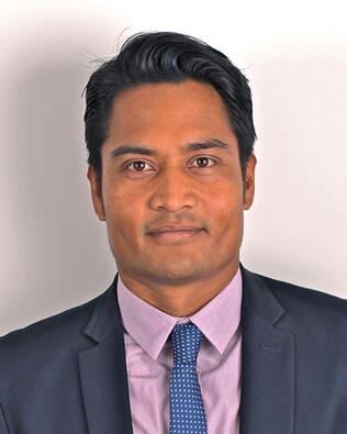 Headshot of Christian De Vera