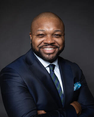 Headshot of Tony Cross