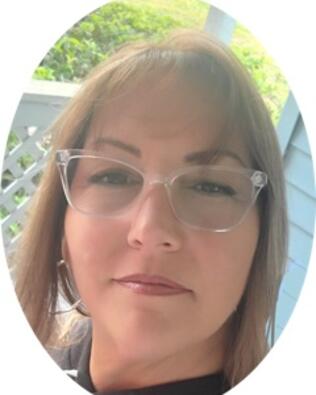 Headshot of Dina Tassell