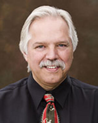 Headshot of Michael Cowans