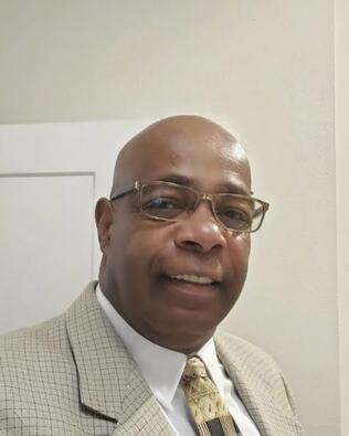 Headshot of Dennis Hudson Sr