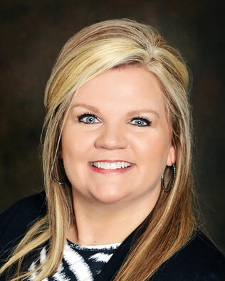 Headshot of Amy Uzzo Spears