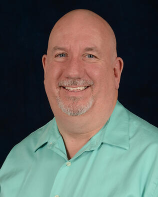 Headshot of Kevin Arnold