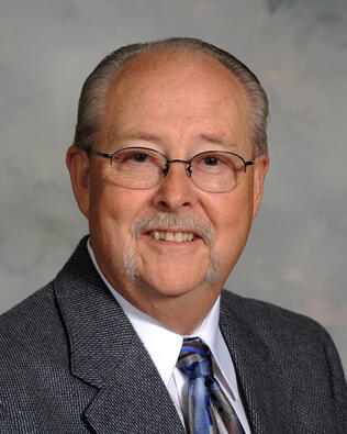 Headshot of Garey Allred