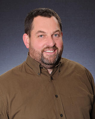 Headshot of Christopher De Witt