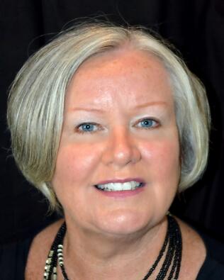 Headshot of Nancy Denelle