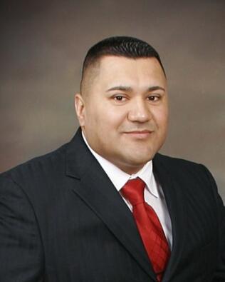 Headshot of Rick Munoz