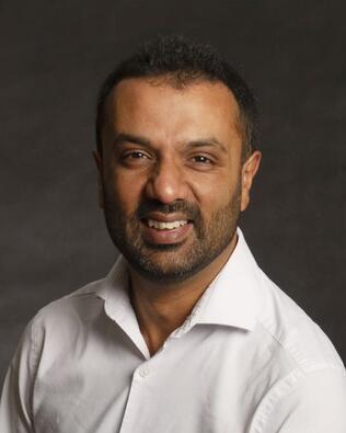 Headshot of Nisarg Desai