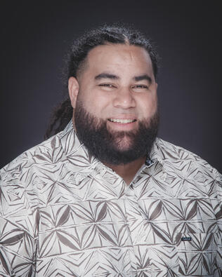 Headshot of David Tuiasosopo