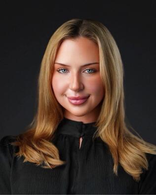 Headshot of Ashley Scott