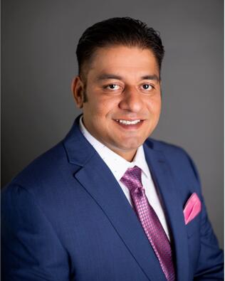 Headshot of Sarbjit Hira