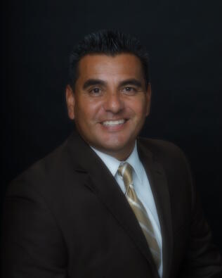 Headshot of Carlos Miramontes