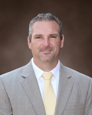 Headshot of Christopher Buscher